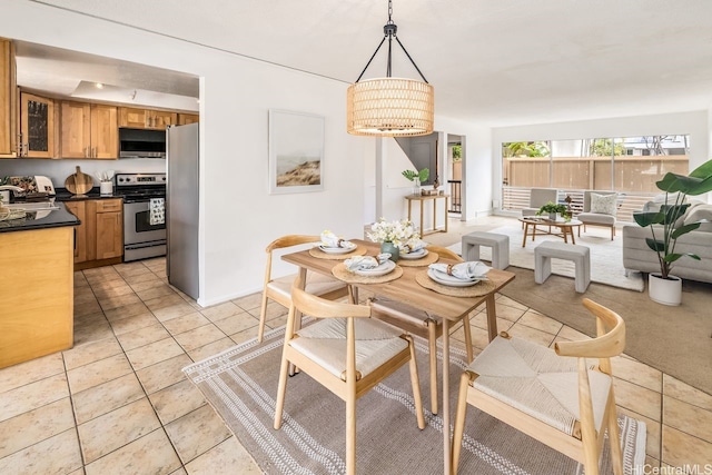 6215 Kawaihae Pl Unit B102, Honolulu, HI 96825 - dining area with light tile patterned floors and baseboards