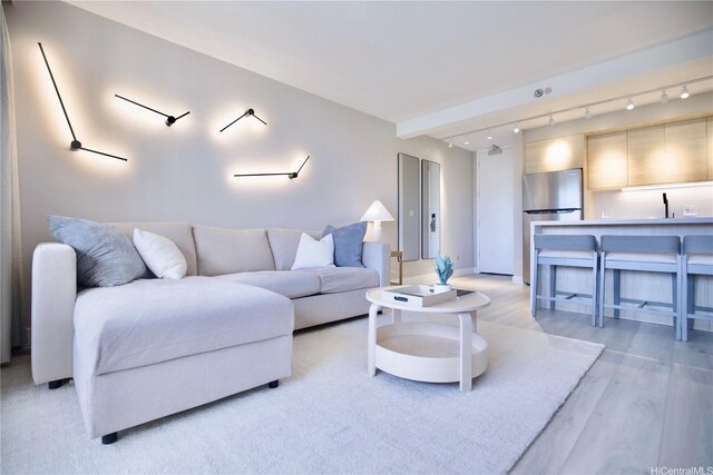 229 Paoakalani Ave Unit 1513, Honolulu, HI 96815 - living room featuring light wood-style floors