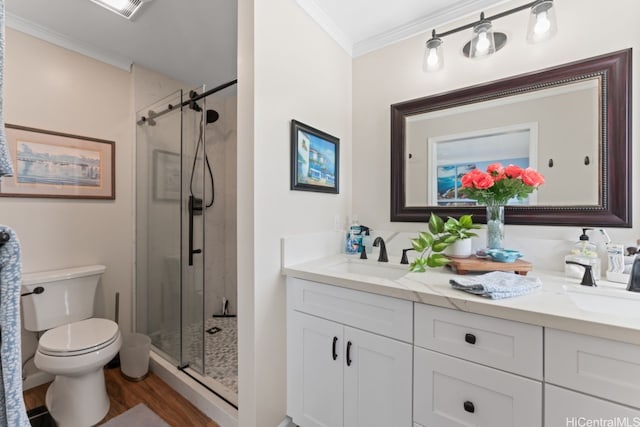 401 Opihikao Pl Unit 272, Honolulu, HI 96825 - full bath featuring crown molding, toilet, double vanity, a shower stall, and wood finished floors