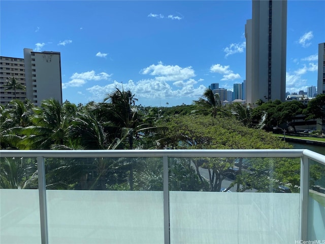 balcony featuring a view of city