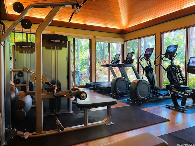 exercise room with wood ceiling