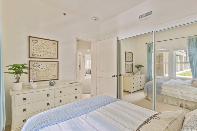 520 Lunalilo Home Rd Unit 8124, Honolulu, HI 96825 - bedroom featuring light carpet, a closet, and visible vents