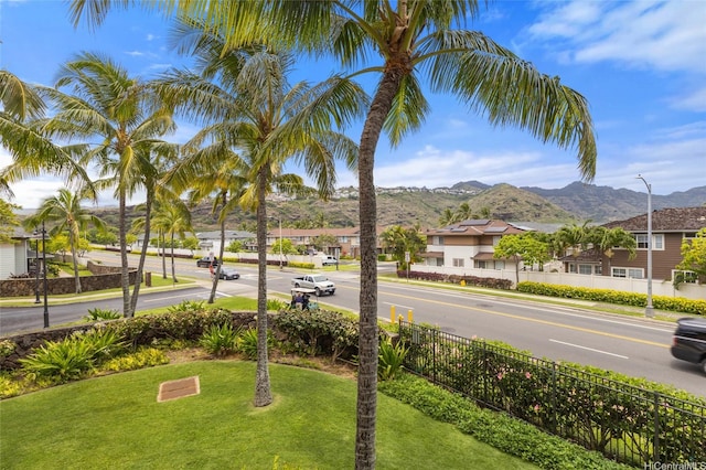 520 Lunalilo Home Rd Unit 8124, Honolulu, HI 96825 - view of street with street lighting, a mountain view, and sidewalks
