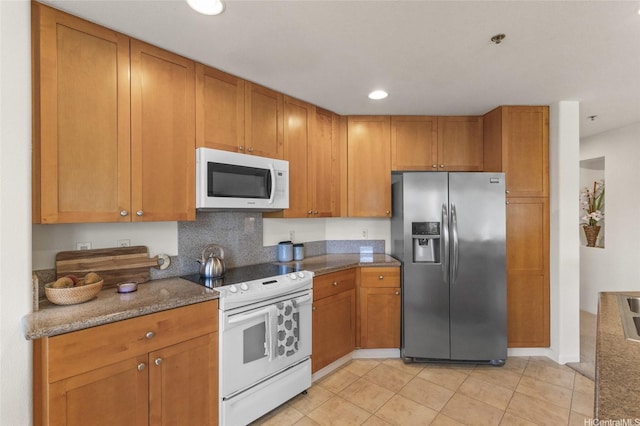 520 Lunalilo Home Rd Unit 8124, Honolulu, HI 96825 - kitchen with brown cabinetry, decorative backsplash, white appliances, recessed lighting, and light tile patterned floors