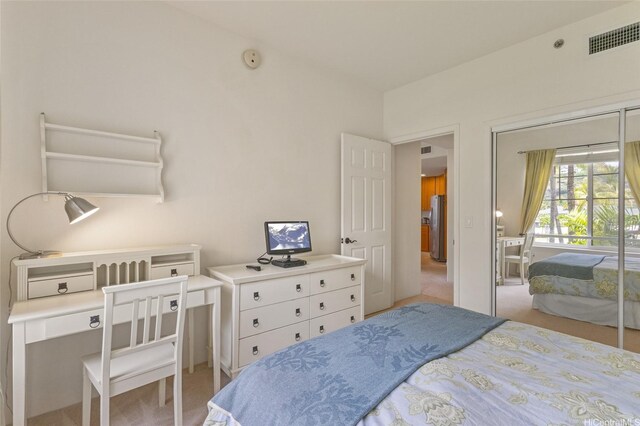 520 Lunalilo Home Rd Unit 8124, Honolulu, HI 96825 - carpeted bedroom with freestanding refrigerator, a closet, and visible vents