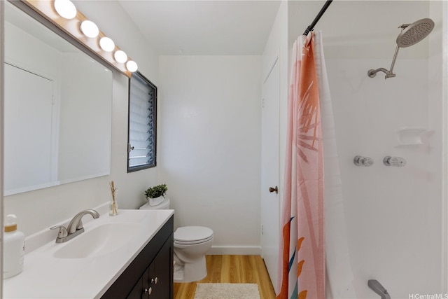 98-512 Kaonohi St Unit 49-3, Aiea, HI 96701 - full bath with vanity, toilet, wood finished floors, and a shower with shower curtain