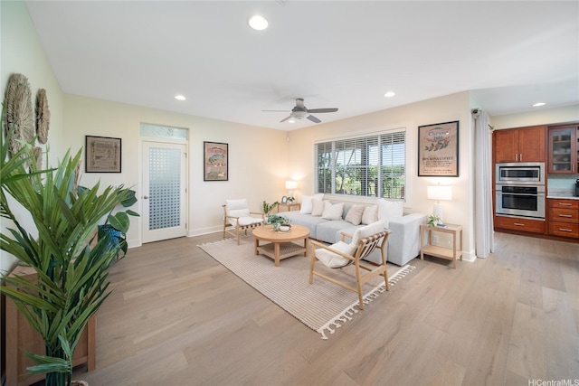 91-1243 Kuanoo St, Ewa Beach, HI 96706 - living area featuring light wood-type flooring, ceiling fan, baseboards, and recessed lighting