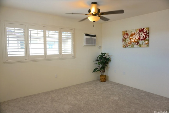 carpeted empty room featuring ceiling fan and a wall mounted AC