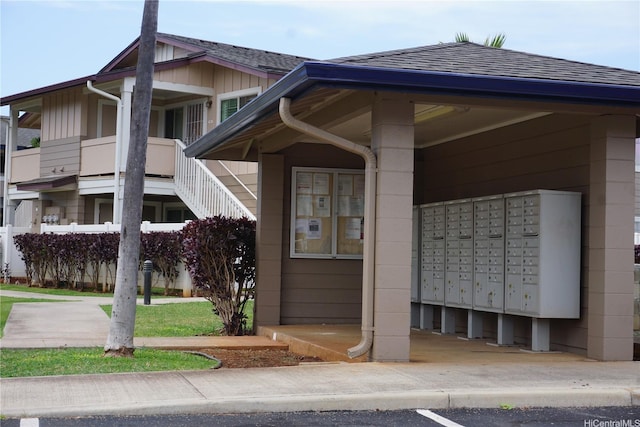 view of home's community with mail area
