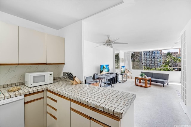 435 Seaside Ave Unit 504, Honolulu, HI 96815 - interior space featuring an outdoor hangout area and ceiling fan