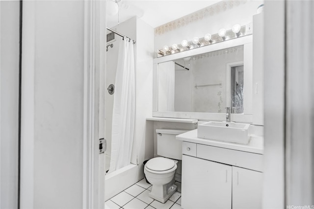 435 Seaside Ave Unit 504, Honolulu, HI 96815 - full bathroom featuring vanity, tile patterned floors, and toilet