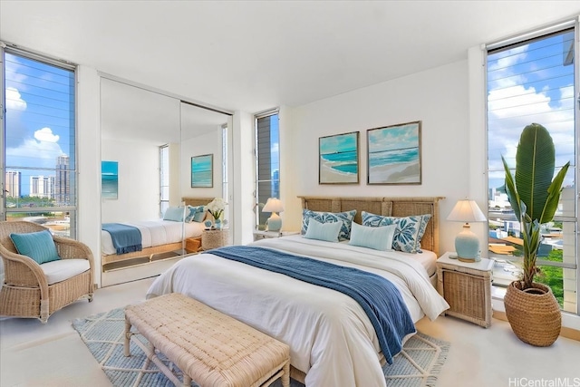 796 Isenberg St Unit 11A, Honolulu, HI 96826 - bedroom featuring floor to ceiling windows and a closet