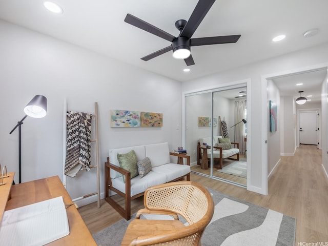 851 Halula Pl, Kailua, HI 96734 - living area with light wood-style floors, ceiling fan, and recessed lighting