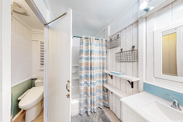 full bathroom featuring vanity, toilet, and shower / tub combo with curtain
