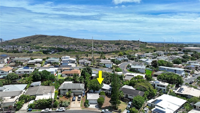 birds eye view of property with a residential view and a mountain view