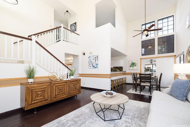 91-1046 Apaa St, Ewa Beach, HI 96706 - living area with a high ceiling, dark wood-style floors, ceiling fan, and stairway