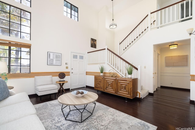 91-1046 Apaa St, Ewa Beach, HI 96706 - living area with stairs, a high ceiling, and hardwood / wood-style floors
