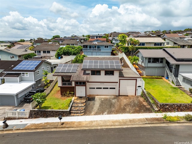 birds eye view of property with a residential view