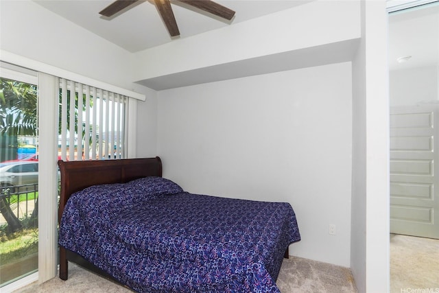 carpeted bedroom with a ceiling fan