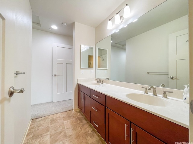 full bath featuring double vanity and a sink
