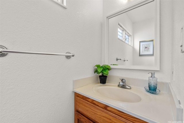 103 Kahako St Unit A, Kailua, HI 96734 - bathroom with vanity and a textured wall