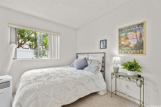 103 Kahako St Unit A, Kailua, HI 96734 - bedroom with carpet and a textured ceiling