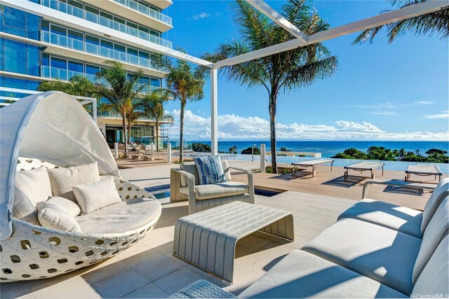1118 Ala Moana Blvd Unit 1203, Honolulu, HI 96814 - view of patio featuring a water view and outdoor lounge area