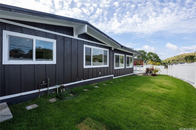 1242 Auwaiku St, Kailua, HI 96734 - view of home's exterior with board and batten siding