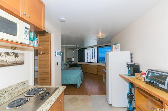 1700 Ala Moana Blvd Unit 1602, Honolulu, HI 96815 - kitchen with white appliances and a toaster