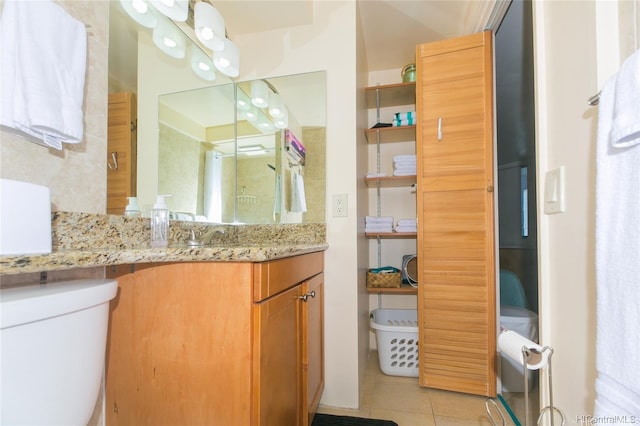 1700 Ala Moana Blvd Unit 1602, Honolulu, HI 96815 - bathroom featuring vanity, tile patterned flooring, and toilet