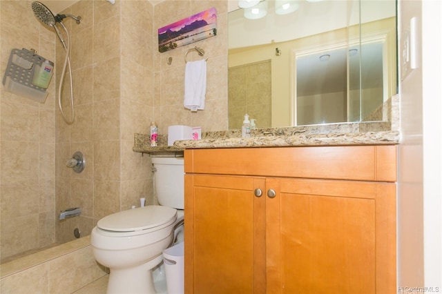 1700 Ala Moana Blvd Unit 1602, Honolulu, HI 96815 - bathroom featuring tile walls, tile patterned flooring, vanity, toilet, and tiled shower