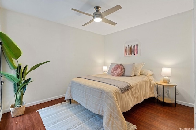 1015 Aoloa Pl Unit 258, Kailua, HI 96734 - bedroom featuring baseboards, a ceiling fan, and wood finished floors