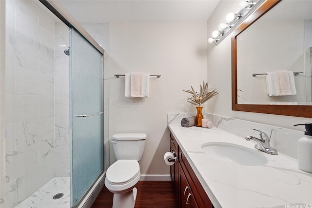 1015 Aoloa Pl Unit 258, Kailua, HI 96734 - full bathroom featuring wood finished floors, baseboards, a stall shower, and toilet