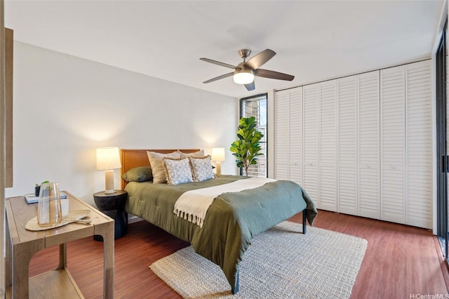 1015 Aoloa Pl Unit 258, Kailua, HI 96734 - bedroom featuring a ceiling fan and wood finished floors