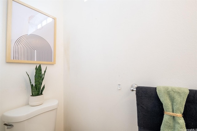 bathroom featuring toilet