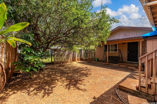 view of yard with a fenced backyard