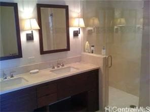 1551 Ala Wai Blvd Unit 1704, Honolulu, HI 96815 - full bath featuring double vanity, a sink, and a stall shower