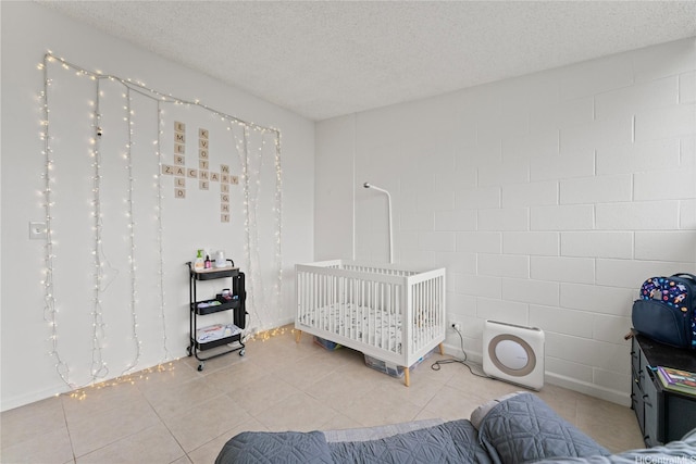 46-259 Kahuhipa St Unit 318B, Kaneohe, HI 96744 - bedroom featuring a textured ceiling and light tile patterned floors