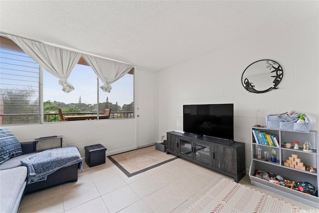 46-259 Kahuhipa St Unit 318B, Kaneohe, HI 96744 - living room with a textured ceiling and tile patterned flooring
