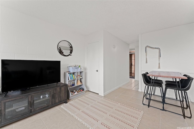 46-259 Kahuhipa St Unit 318B, Kaneohe, HI 96744 - tiled living room with baseboards