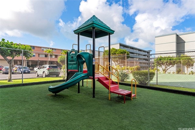 46-259 Kahuhipa St Unit 318B, Kaneohe, HI 96744 - community playground with a lawn and fence