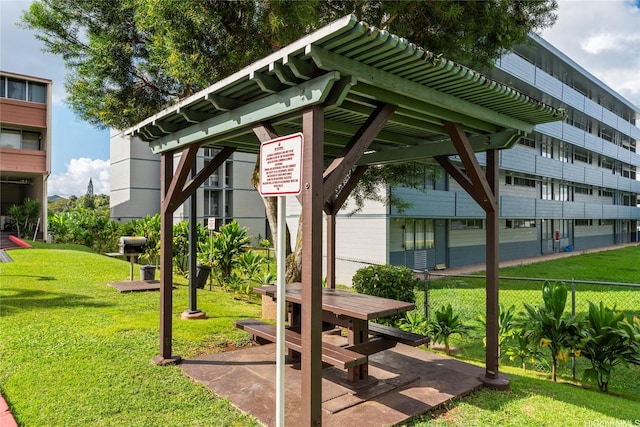 46-259 Kahuhipa St Unit 318B, Kaneohe, HI 96744 - view of community with a lawn and fence