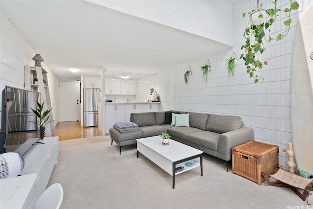 living room with light colored carpet