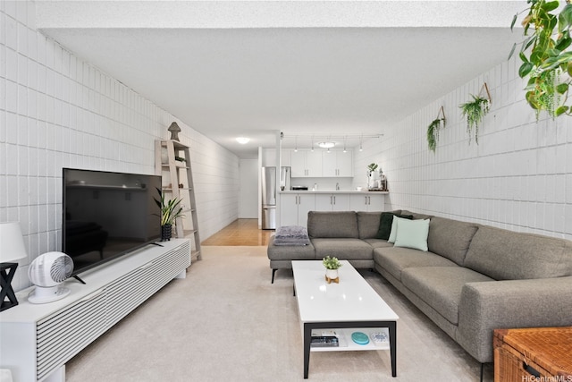 living room with light carpet