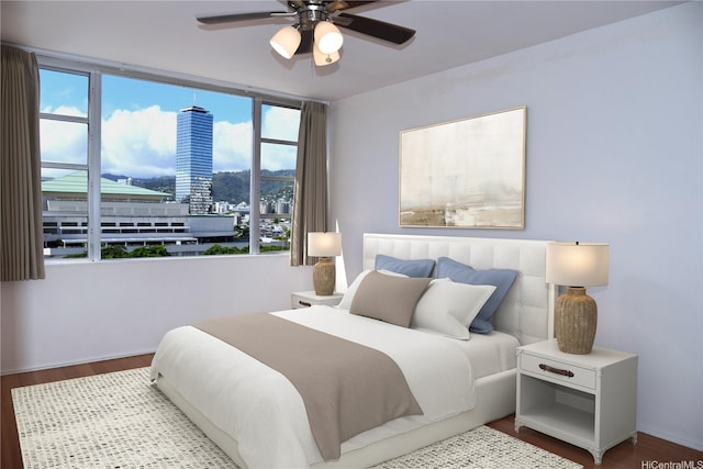 bedroom with a ceiling fan and wood finished floors