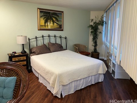 1700 Ala Moana Blvd Unit 3101, Honolulu, HI 96815 - bedroom with baseboards and wood finished floors