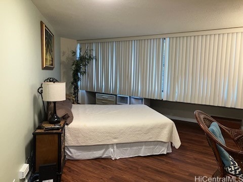 1700 Ala Moana Blvd Unit 3101, Honolulu, HI 96815 - bedroom featuring wood finished floors