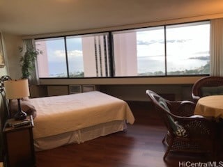 1700 Ala Moana Blvd Unit 3101, Honolulu, HI 96815 - bedroom featuring wood finished floors
