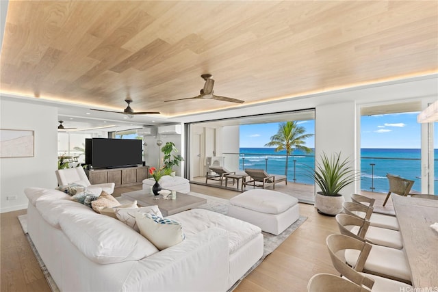 living area with a wall mounted air conditioner, wood ceiling, a ceiling fan, and light wood-style flooring