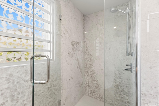full bathroom with a shower stall